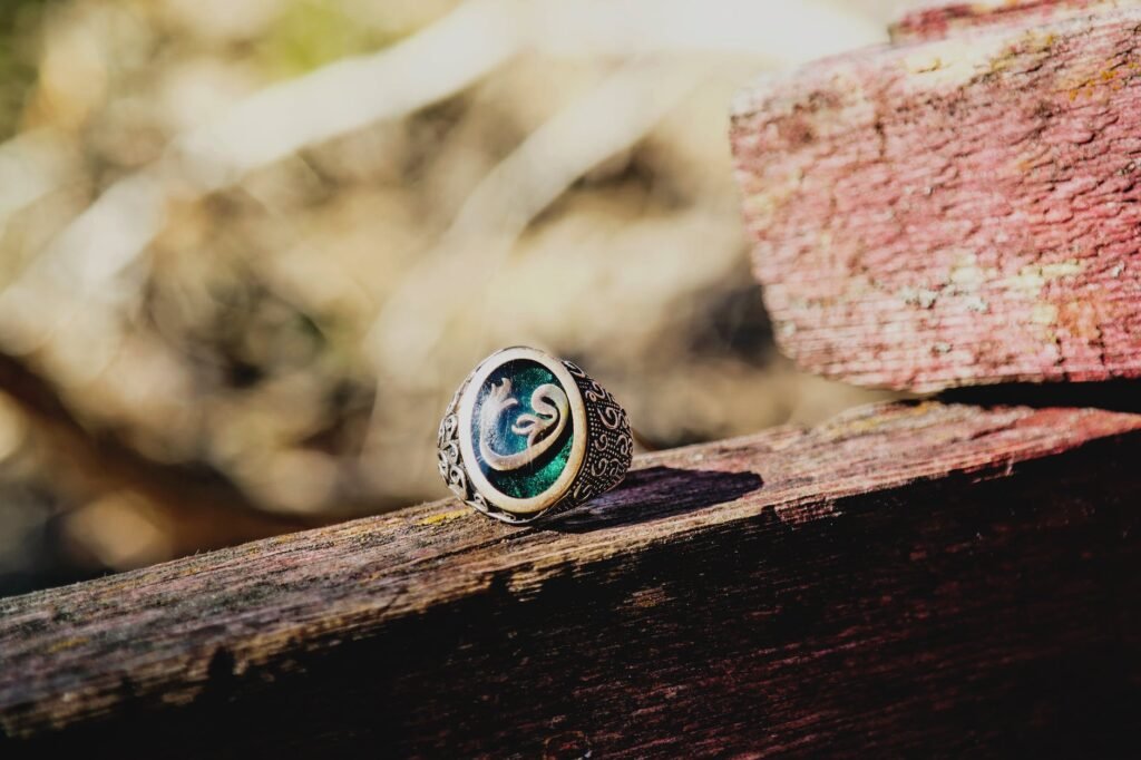 selective focus photo of silver colored vav ring